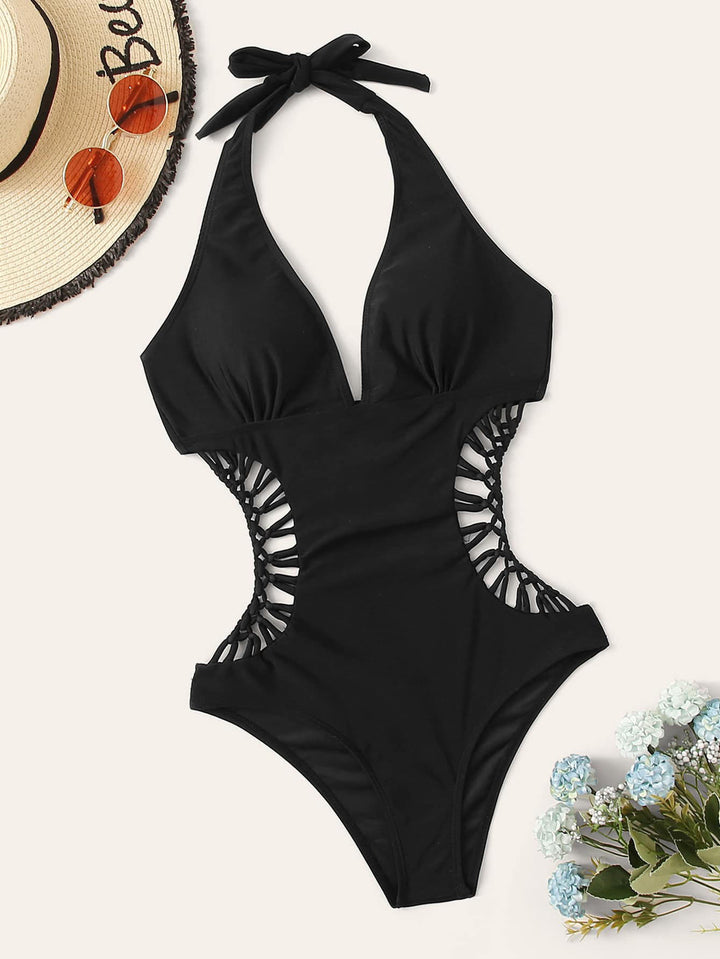 Damebadedragt med moderne cut-out-detaljer og justerbart halterneck Stilla