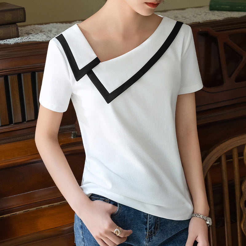 Dame elegant top med en moderne asymmetrisk krave og stilfulde kontrastaccenter Stilla