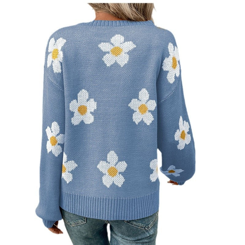 Dame strikbluse med florale accenter og løs pasform Stilla