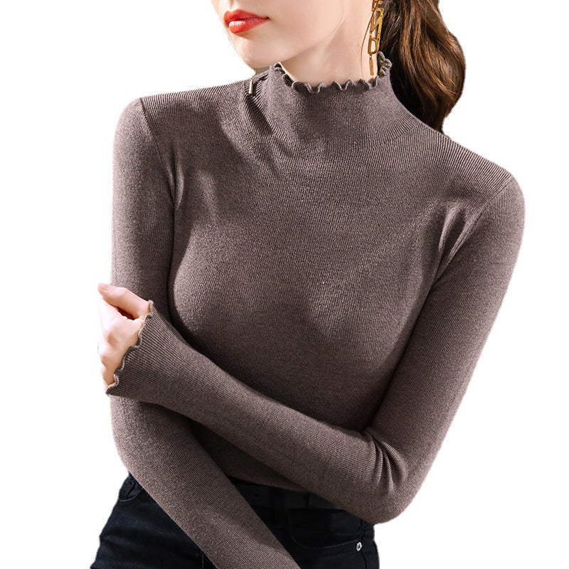 Dame Turtleneck top med elegante flæsedetaljer og fin struktur Stilla