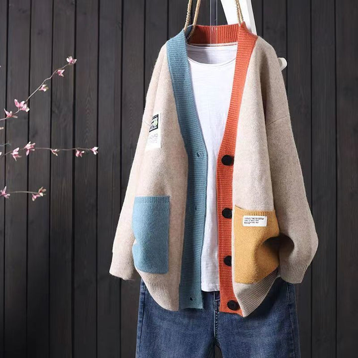 Kvinders oversized cardigan med farverige lommer og knapdetaljer Stilla