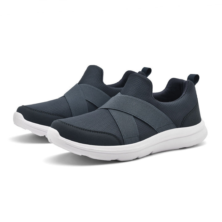 Dame nan elastisk Slip-On Komfort-sneaker med åndbart strikkoverdel, krydsede strækremme og stødabsorberende EVA-sål Skovae