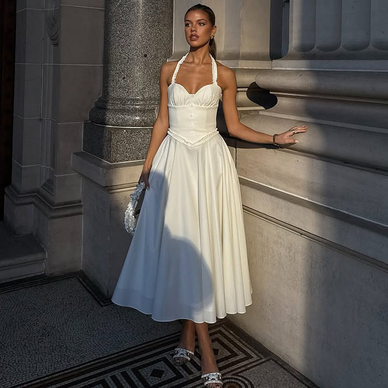 Dame Midi-kjole med elegant halterdesign og raffinerede flæsedetaljer Stilla