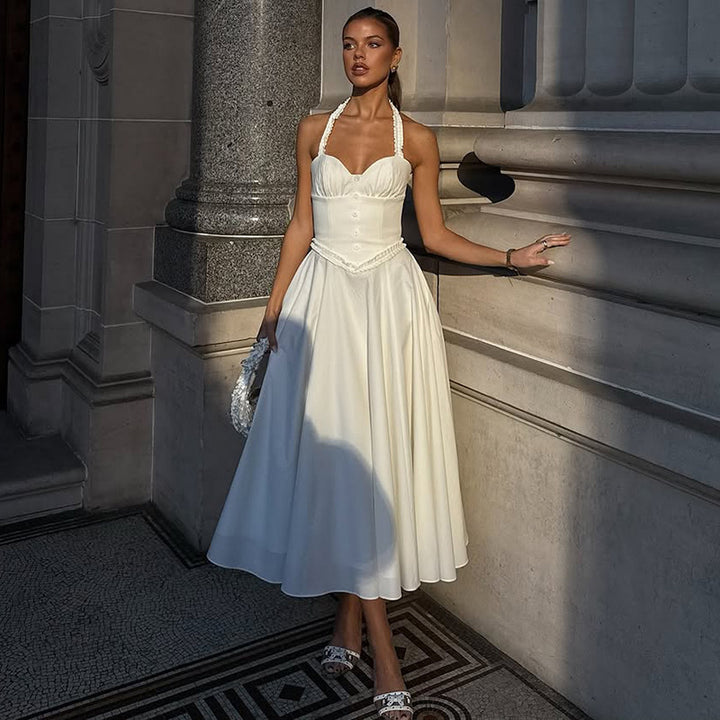 Dame Midi-kjole med elegant halterdesign og raffinerede flæsedetaljer Stilla