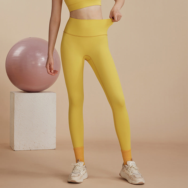 Dame højtaljede yogaleggings i åndbart materiale med figursyet snit Stilla