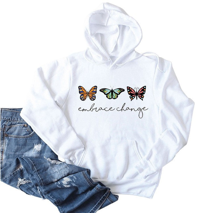 Dame hoodie med inspirerende sommerfuglemotiv og motiverende budskab Stilla