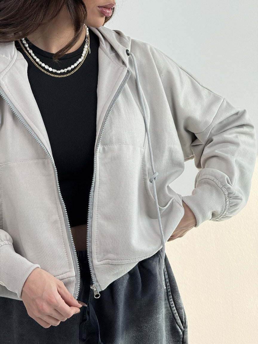 Dame afslappet zip hoodie med brede ærmer og praktiske lommer