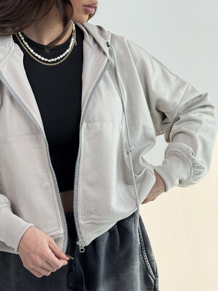 Dame afslappet zip hoodie med brede ærmer og praktiske lommer