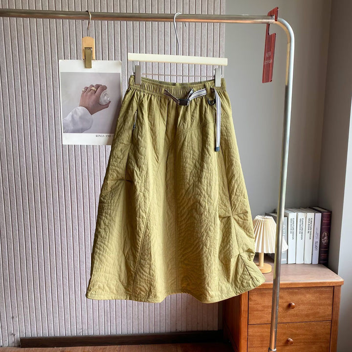 Kvindernes elegante midi-nederdel med praktisk elastisk talje og sidelommer Stilla