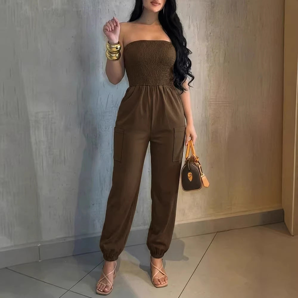 Damer Behagelig Jumpsuit med skulderfri design og praktiske lommer Skovae