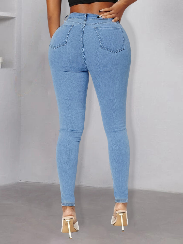 Dame Skinny Jeans med dekorative perleudsmykninger og moderne revnedetaljer Stilla