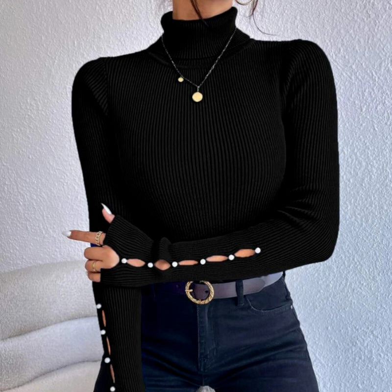Femme Ribstrik Rullekravepullover med udskåret ærme-detalje Stilla