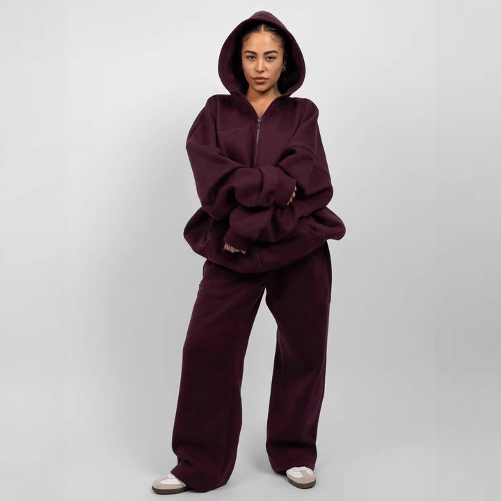Dame sporty fleece sæt med høj krave og praktiske lommer Skovae