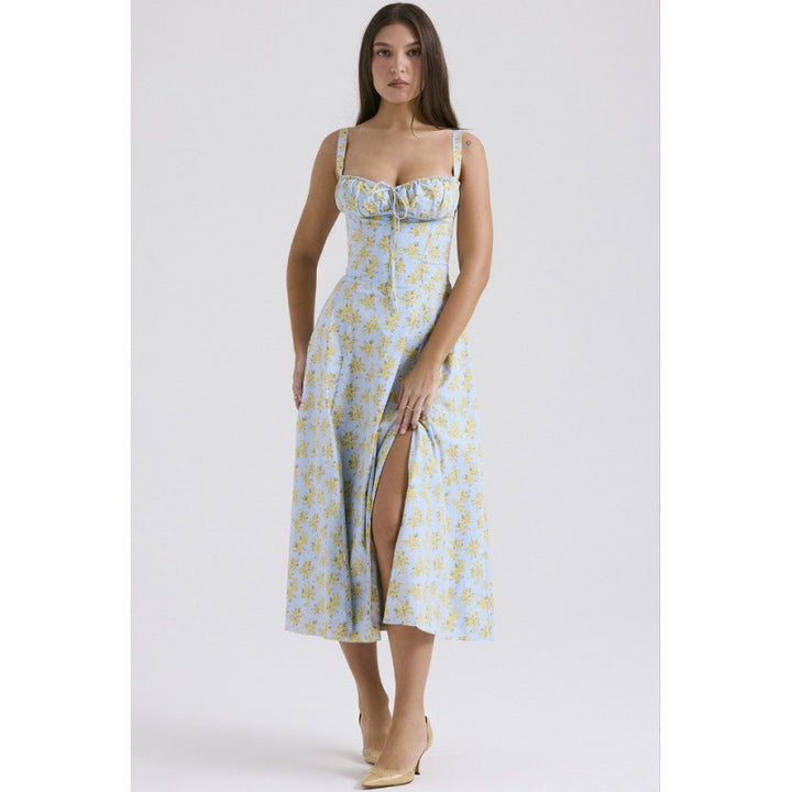 Dame maxikjole med floral design og elegant slids Skovae
