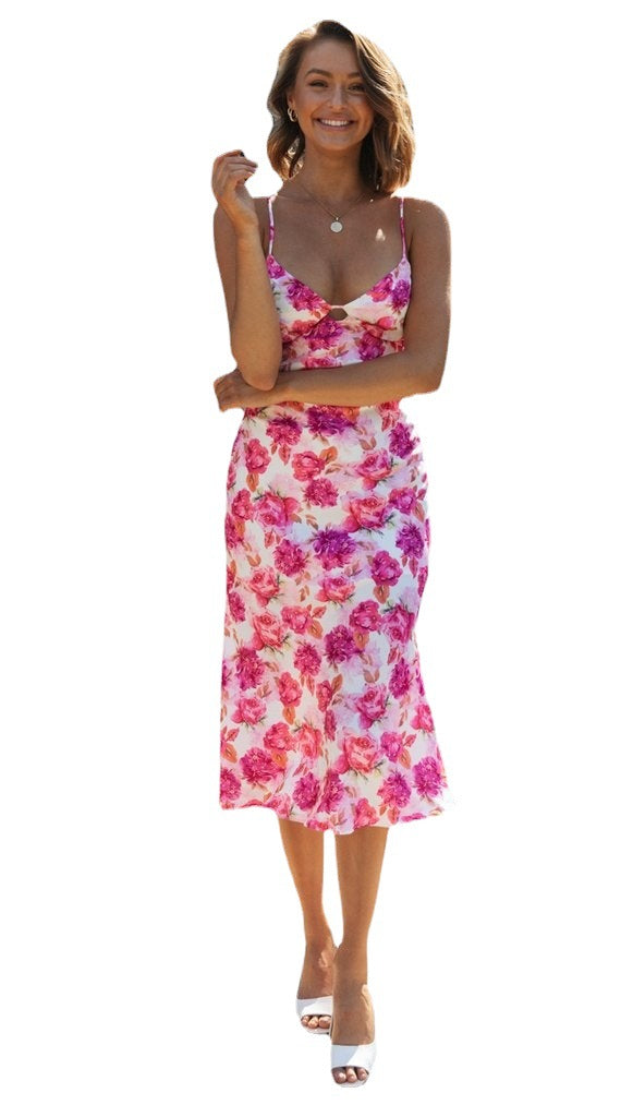 Dame sommerligt midi-kjole med delikat floral-design og smalle stropper Stilla