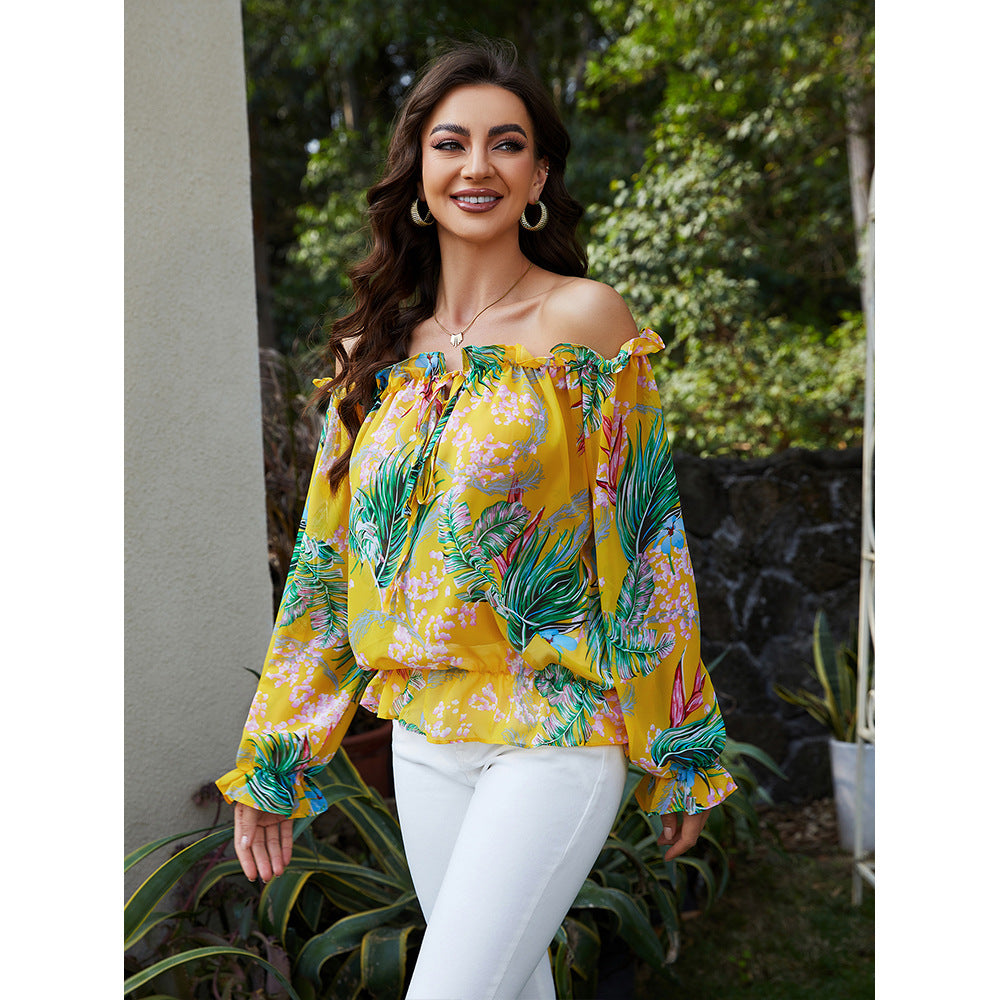 Damer off-shoulder bluse med blomsterdesign og flæsedetaljer Stilla