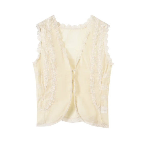 Dame-spidsen top med elegante ruffledetaljer og knaplukninger Skovae