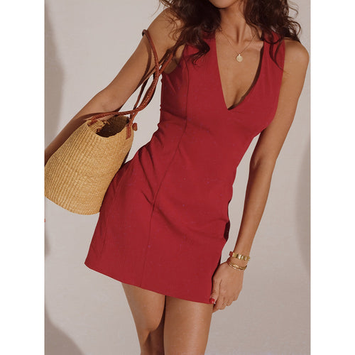 Dame wrapped dress with deep V-neck and figure-hugging fit Skovae