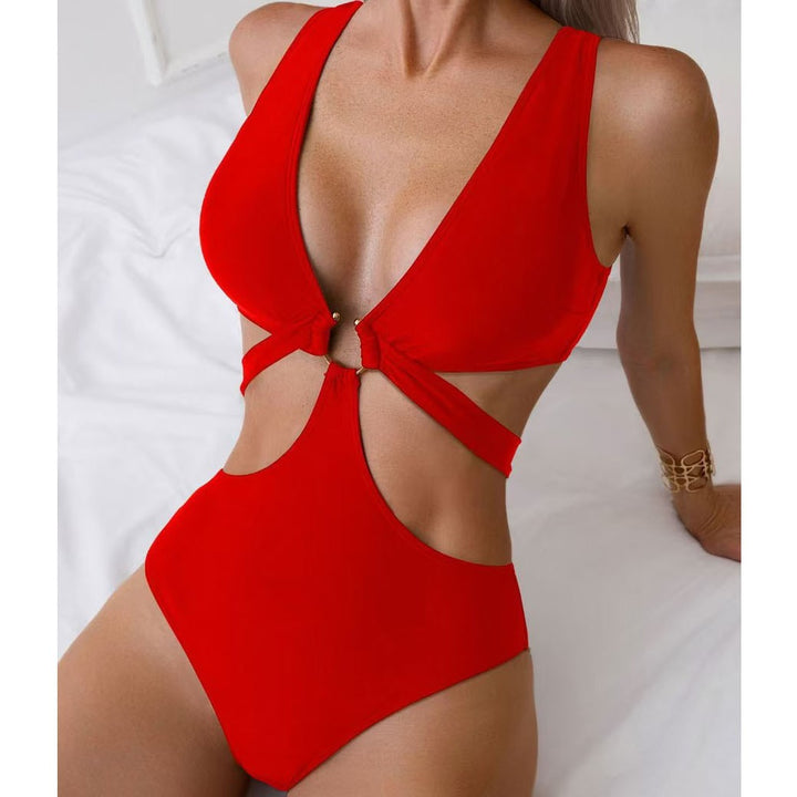 Dame heldragt badedragt med innovativt cut-out-design og sporty knude Stilla