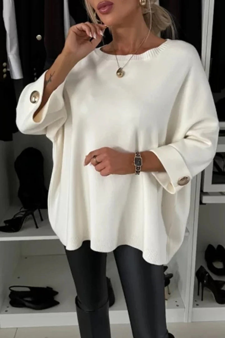 Damer mode oversized sweater med elegante knapdetaljer Stilla