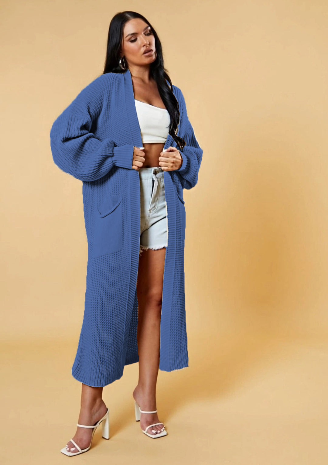 Kvinders lange strikket cardigan med åbent design og praktiske lommer Stilla