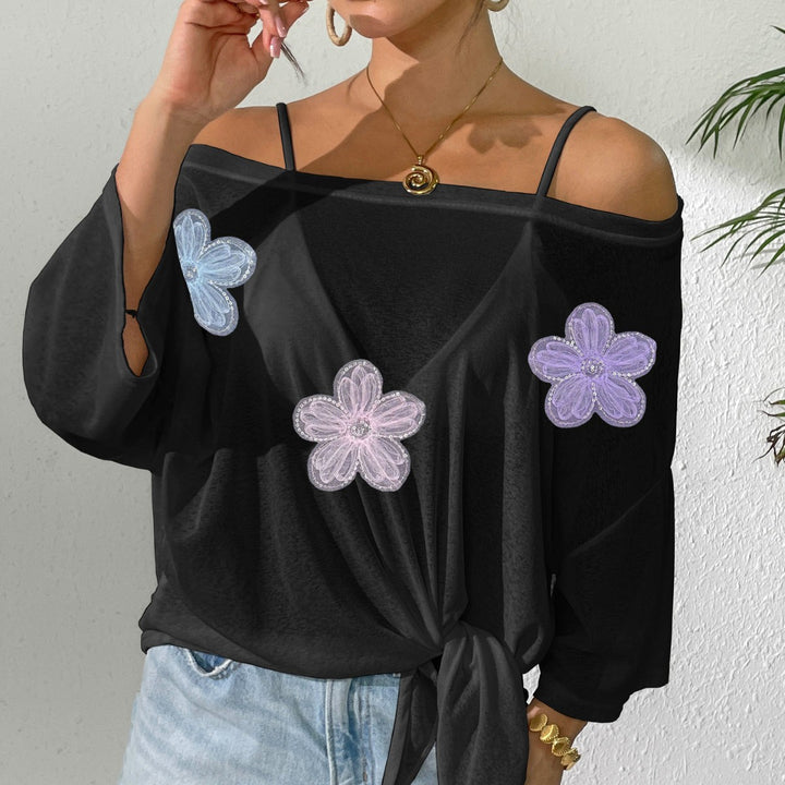 Dame afslappet top med blomstermotiv og sideløkke Skovae