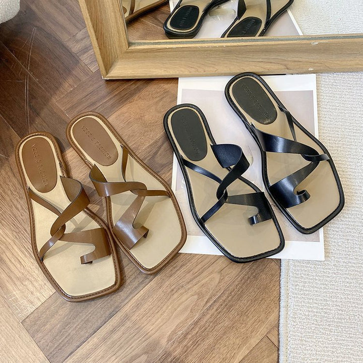 Dame slide-sandaler med moderne krydsriemedesign og komfortabel fodseng Stilla