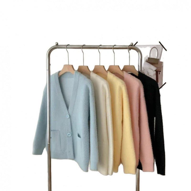 Kvinders fluffy knap cardigan med elegante lommer Stilla