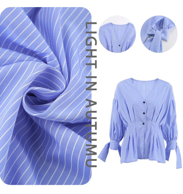 Damebluse med taillieret snit og ruffle detaljer Stilla