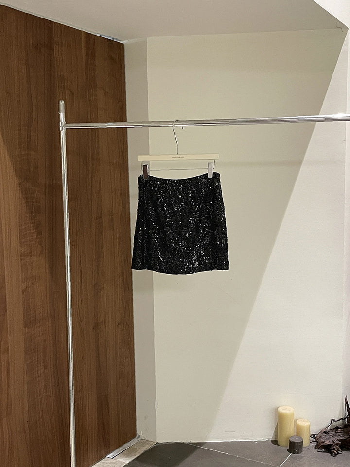 Dame glitrende mini nederdel med elastisk talje og trendy design Stilla