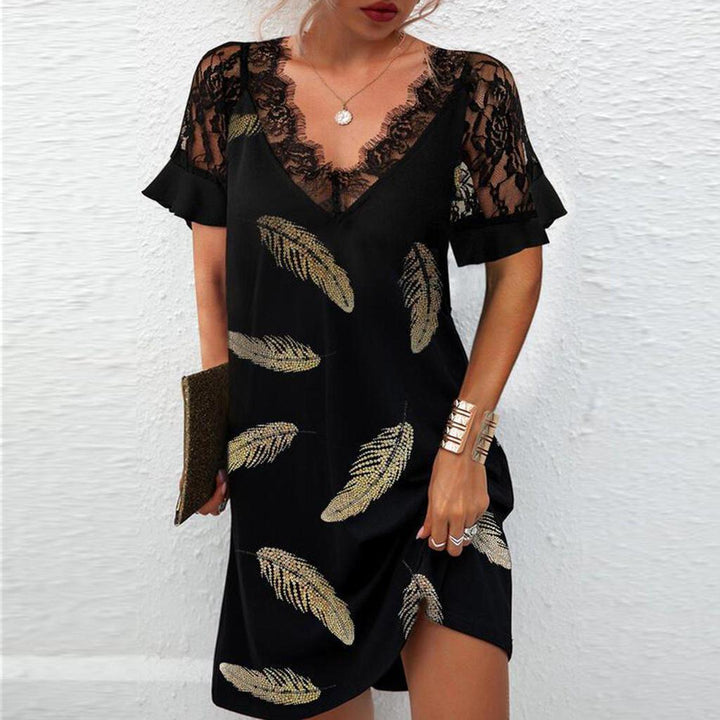 Dame spidse kjole med floralt design Stilla