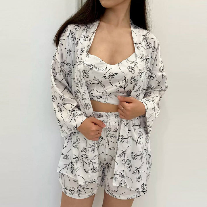 Dame pyjamasæt med detaljeret blomsterdesign og luftig pasform Stilla