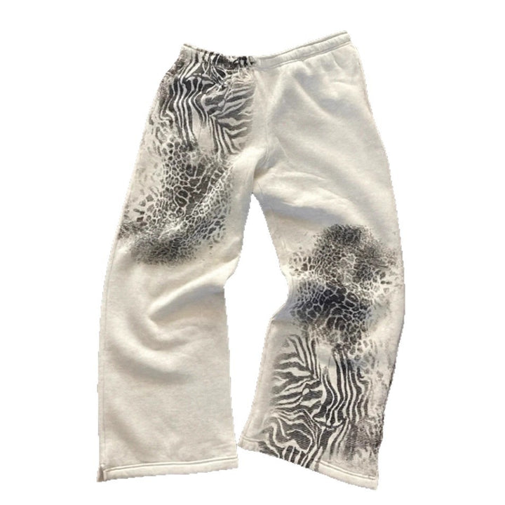 Dame nan løse sweatpants med asymmetrisk dyreprint, elastisk komfortlinning og lige ben Skovae