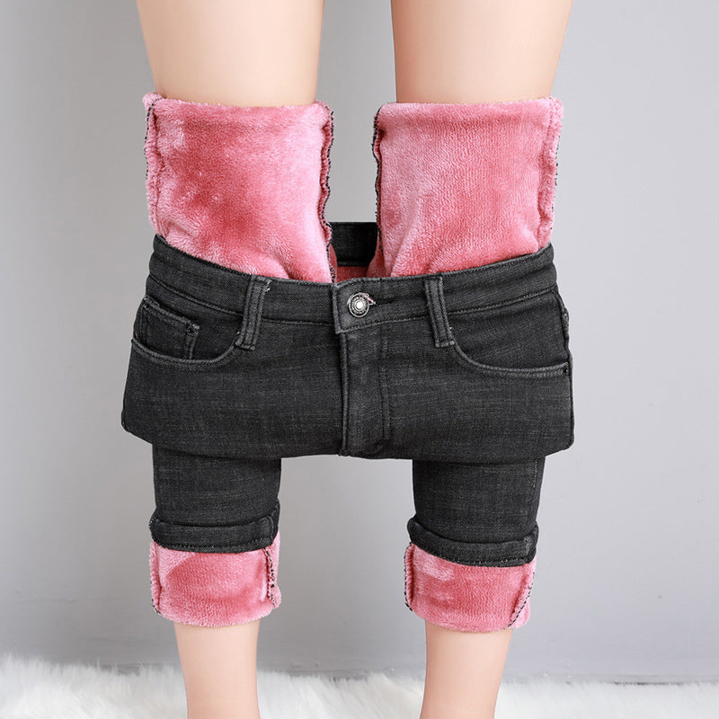 Damerne med højt skårne rørjeans med formende strækbånd og smal ankelafslutning Skovae