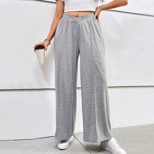 Dame løs siddende fritidshose med elastisk talje og crossover-design Skovae