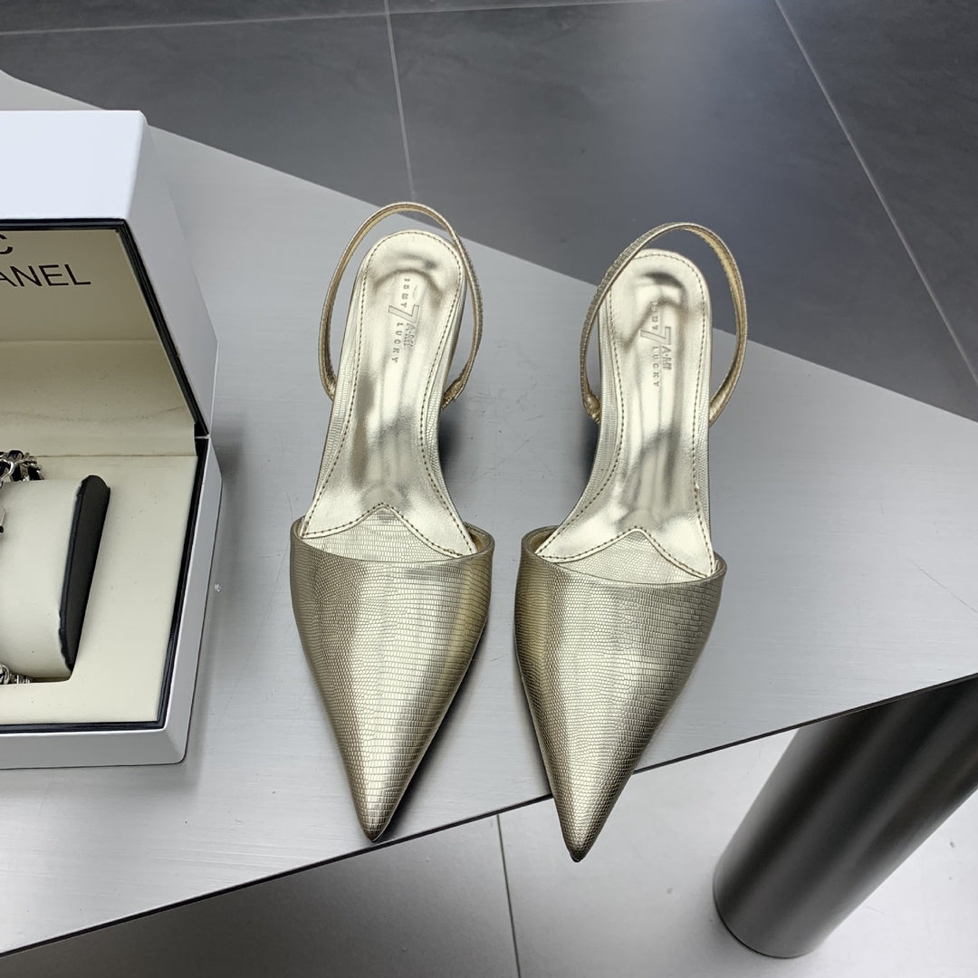 Dame Sling-pumps med elegant spids og fashionable teksturer Stilla