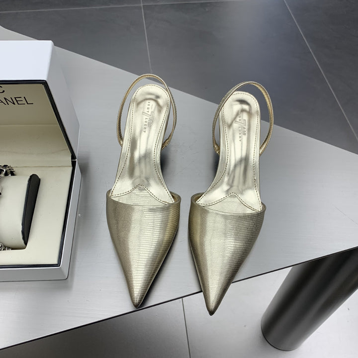 Dame Sling-pumps med elegant spids og fashionable teksturer Stilla