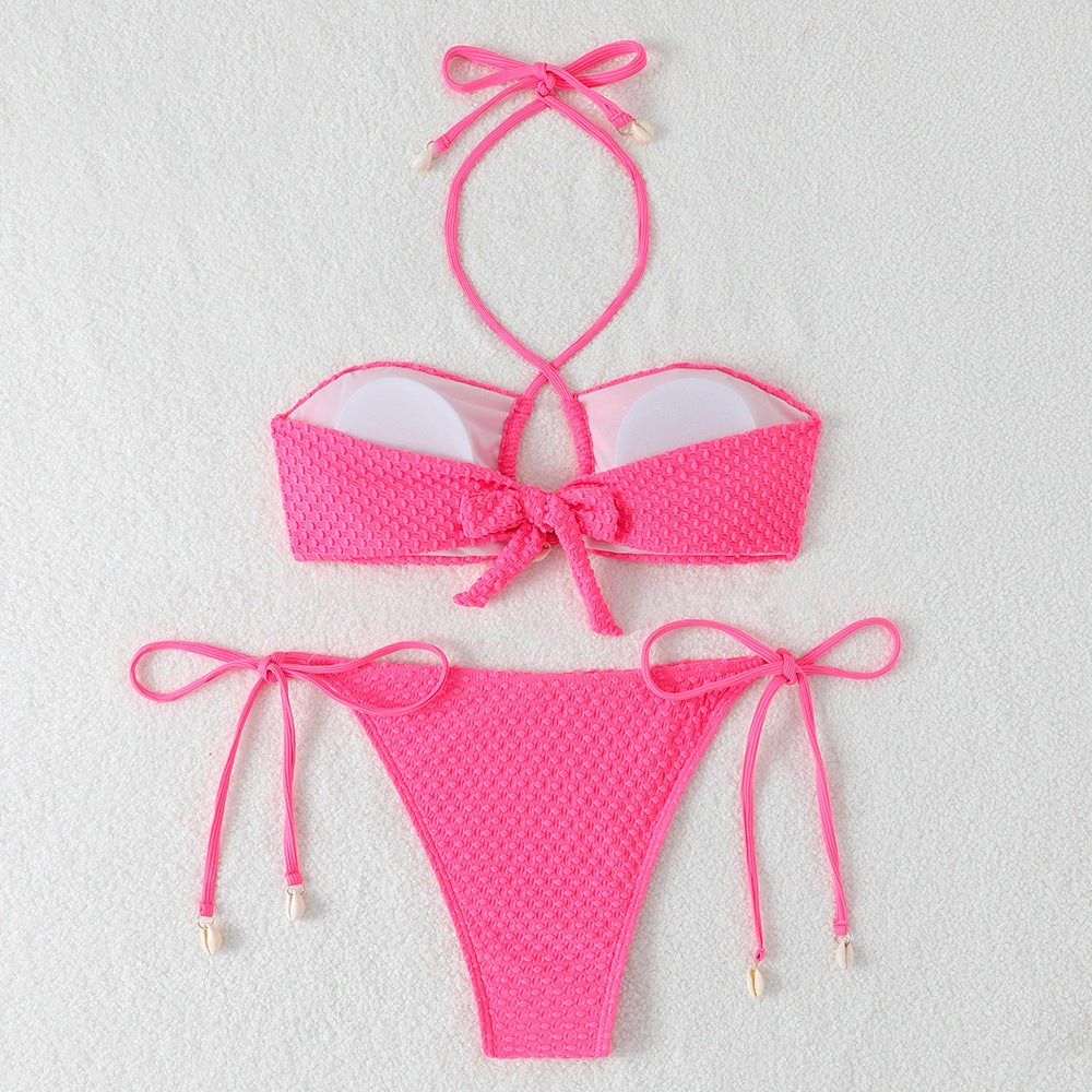 Dame bikini-sæt med innovativt bindemønster og trendy cut-out skovae