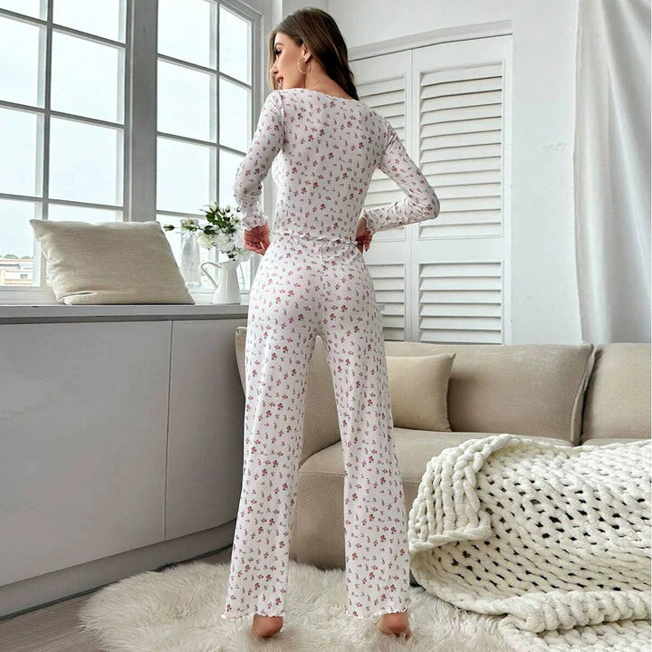 Dame pyjamasæt med blomstermotiv og elegante spidsdetaljer Stilla