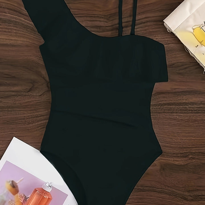 Dame one-piece badesuit med asymmetrisk ruffles design og elegante cut-out detaljer Skovae