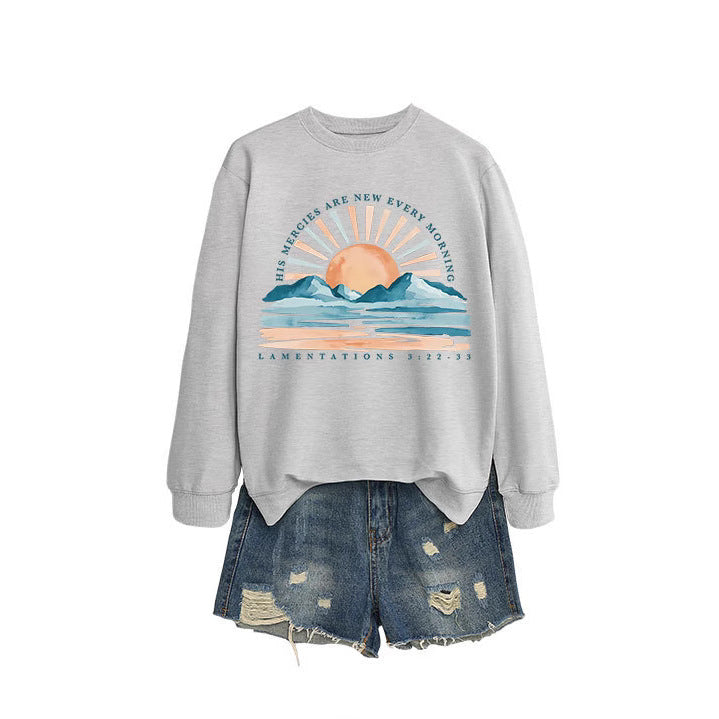 Dame sweatshirt med inspirerende solopgang design og afslappet pasform Stilla