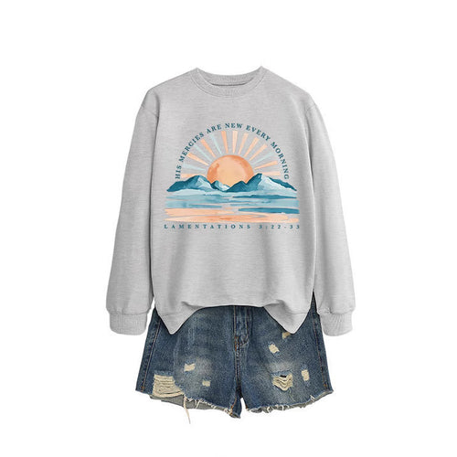 Dame sweatshirt med inspirerende solopgang design og afslappet pasform Stilla