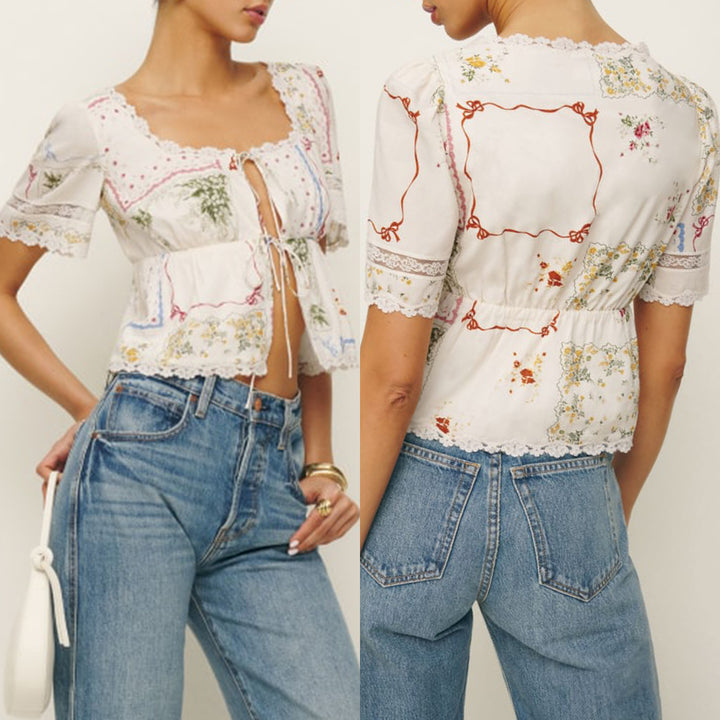 Dame bluse top med blomsteraccent og blonde dekorationer Skovae