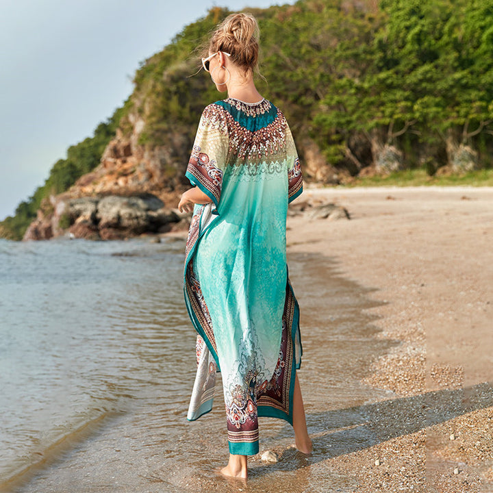 Dame transparent strandtunika med kunstnerisk mønster og elegante detaljer Stilla