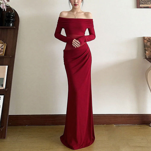 Kvindernes elegante off-shoulder maxikjole med flæsedetaljer og lange ærmer Stilla
