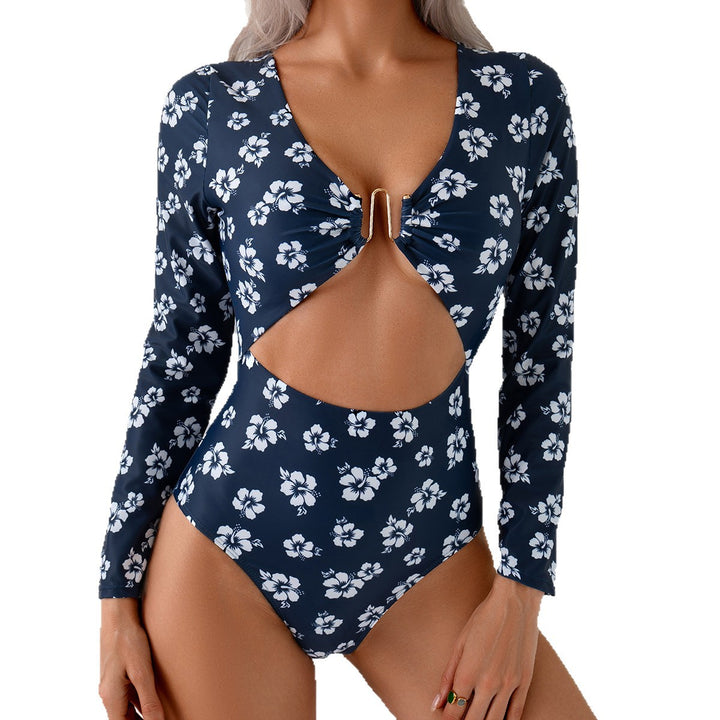 Dame én deler badedragt med floralt cut-out og dekorativ twist Stilla
