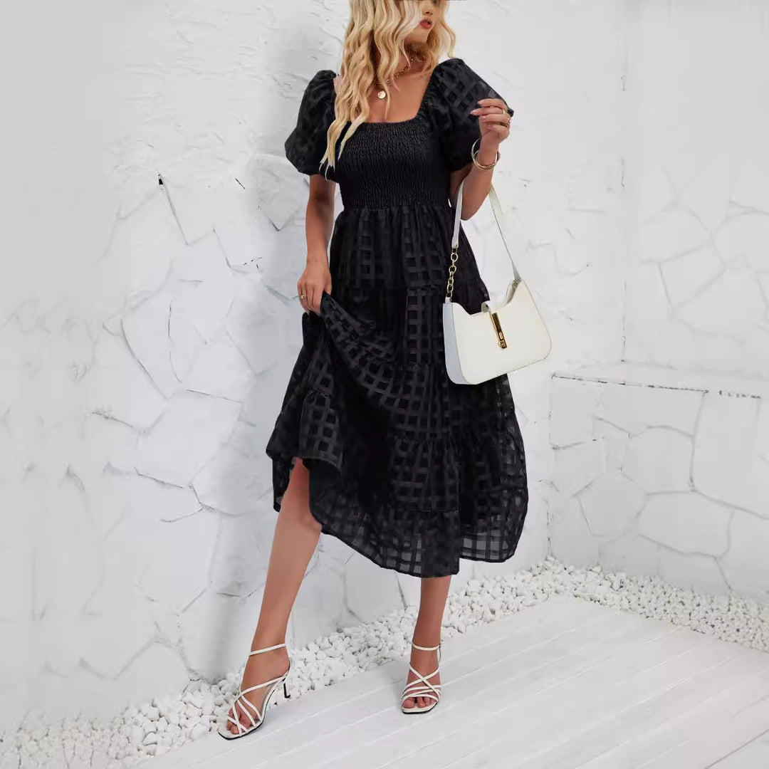 Dame Midikjole med Off-Shoulder-design og luftige Puffærmer Stilla