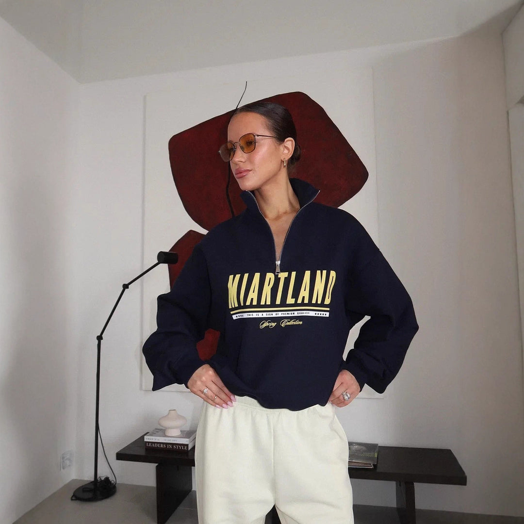 Kvindernes sporty zip pullover med oversize pasform og kreativt print Stilla