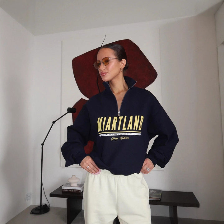 Kvindernes sporty zip pullover med oversize pasform og kreativt print Stilla