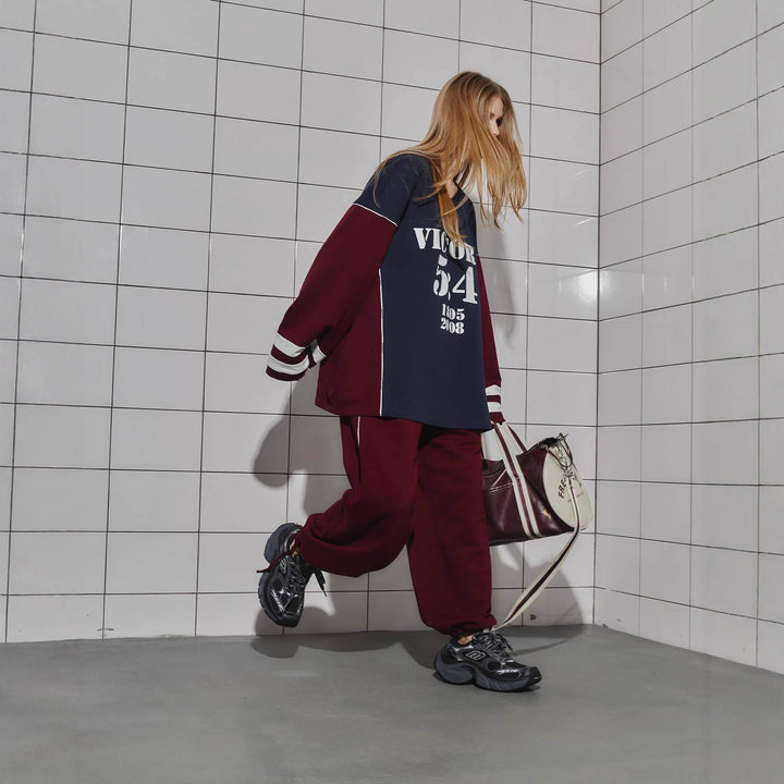 Kvinders oversized tracksuit med grafisk print og brede bukser Stilla